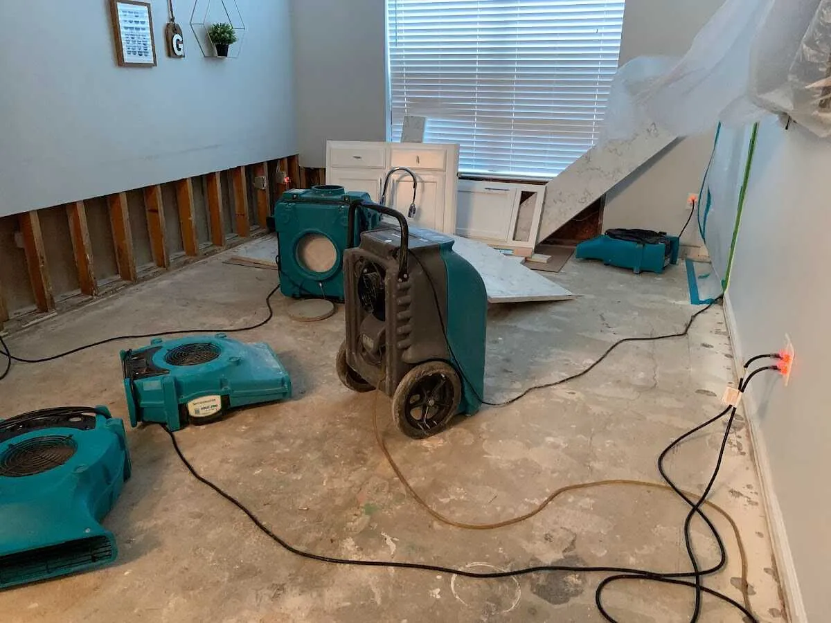 Dehumidifier in flood-cut room for Water Damage Restoration in Huntington
